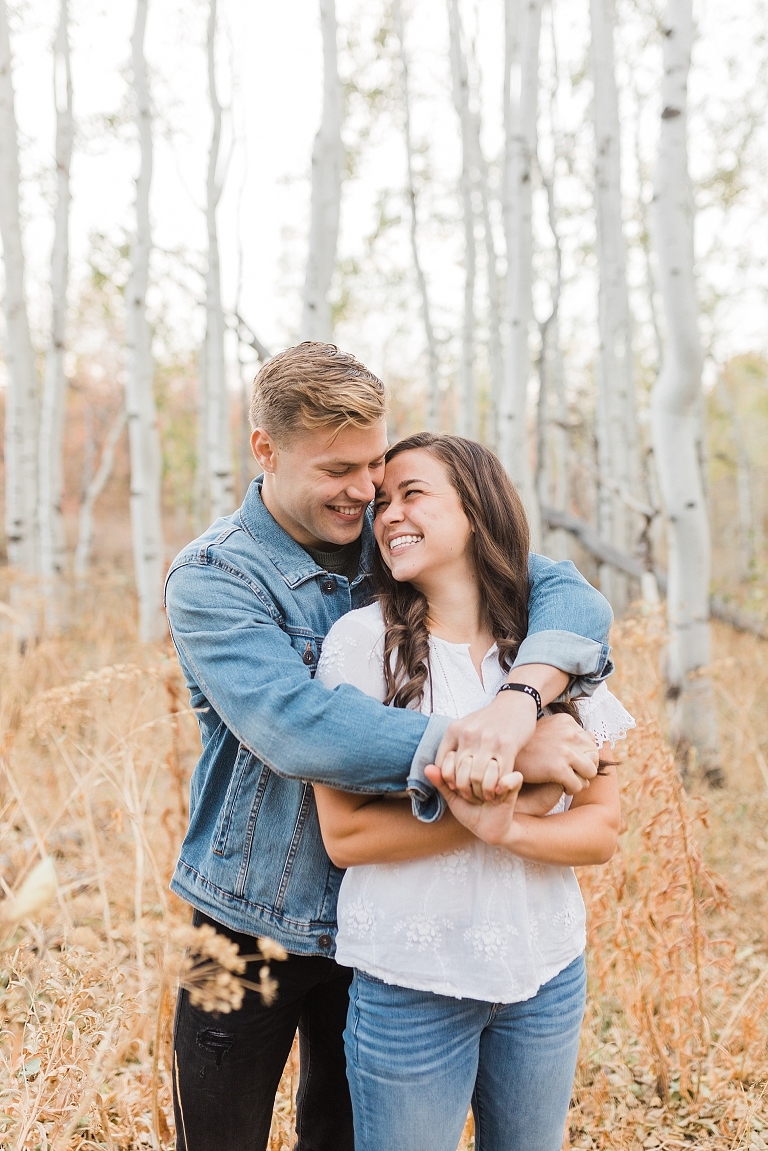 Couple at outdoor engagement session