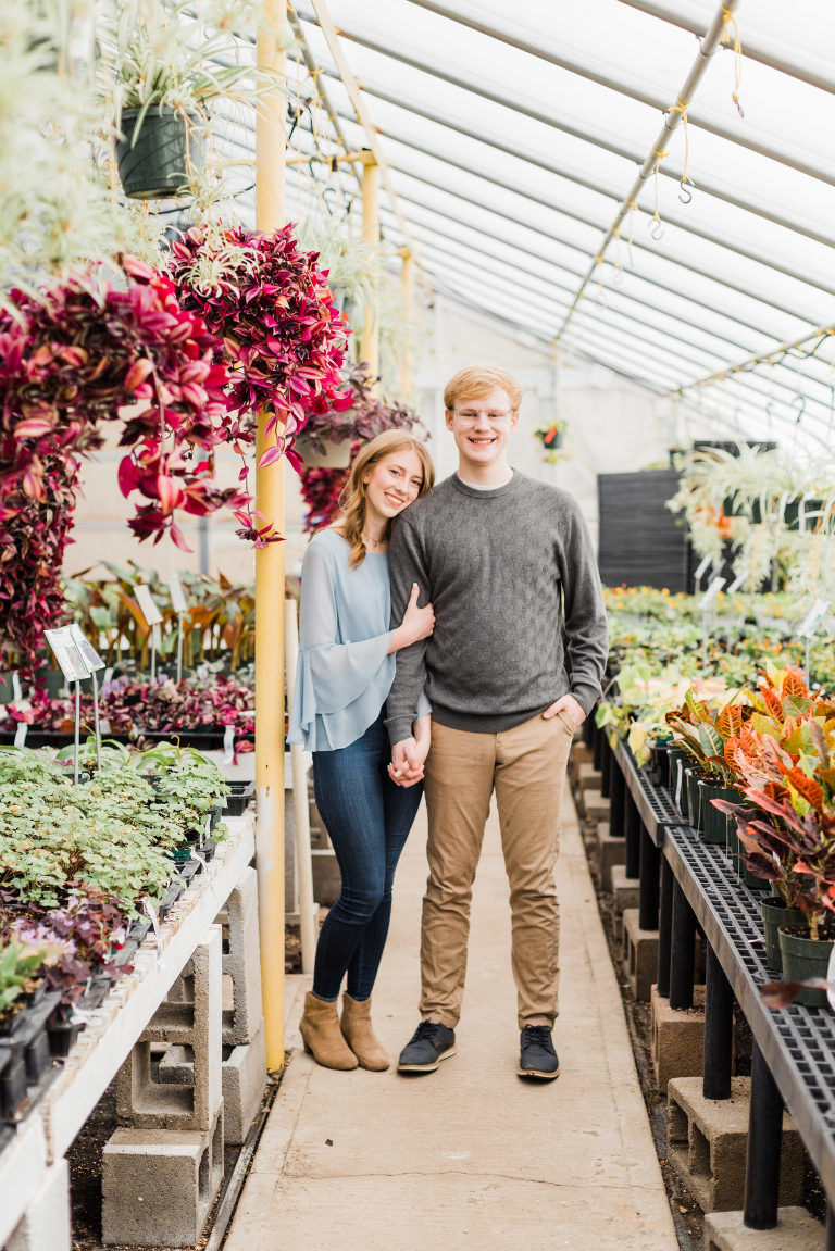 Couple photos in greenhouse